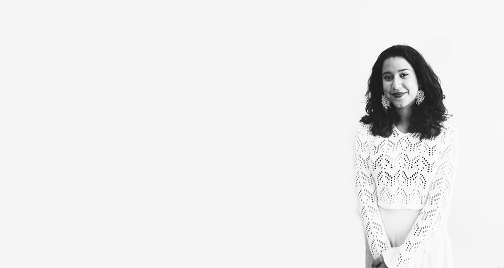 Photo of Rocio Sanchez on a light grey background